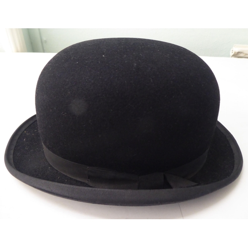 114 - A Colletts of London black silk top hat  8