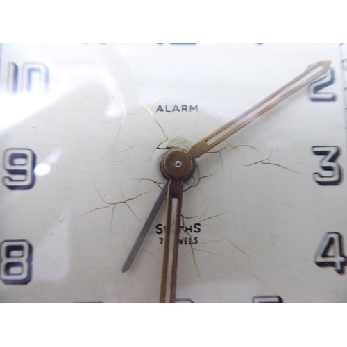 119 - An Art Deco Smith's alarm travel timepiece, faced by an Arabic dial  5