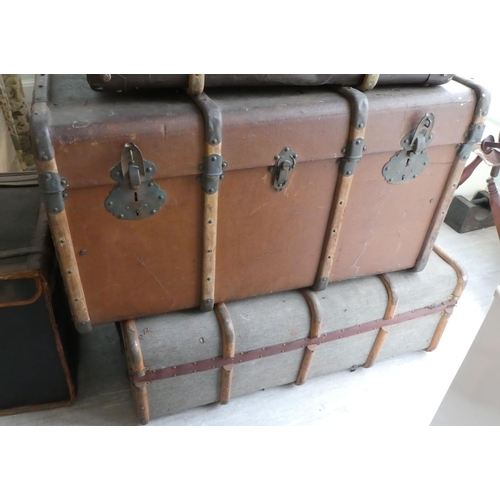 129 - Early/mid 20thC cabin, metal and other trunks  mixed sizes