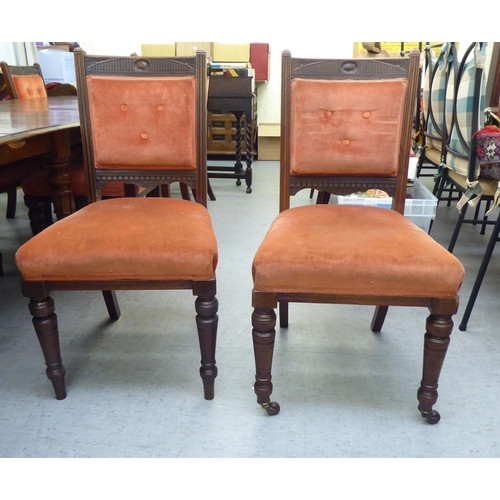 159 - A late Victorian oak dining table, the top with  thumb moulded edge, raised on turned, tapered legs ... 