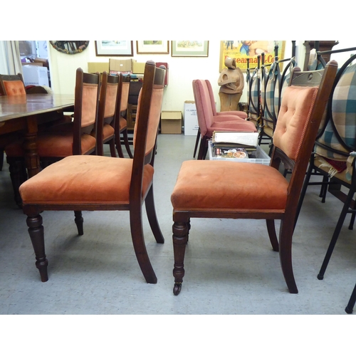 159 - A late Victorian oak dining table, the top with  thumb moulded edge, raised on turned, tapered legs ... 