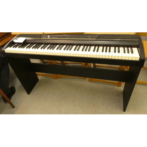 16 - A Korg model no. SP-1705 electric piano  29