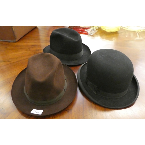 160 - Two felt fedoras; and a bowler hat