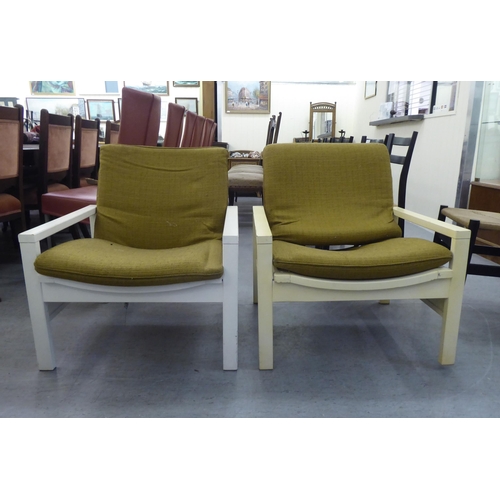 167 - Three 1960s Cornwell-Norton cream painted open arm chairs with original contemporary mustard coloure... 