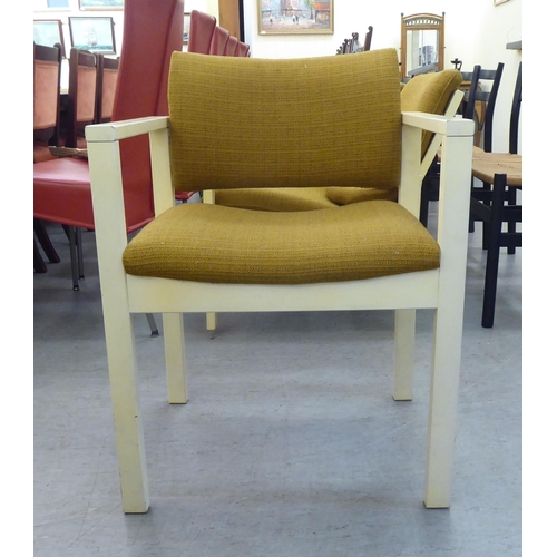 167 - Three 1960s Cornwell-Norton cream painted open arm chairs with original contemporary mustard coloure... 