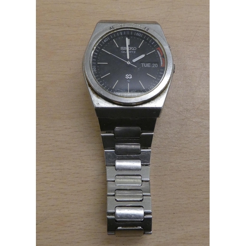 176 - A Seiko Alarm Quartz stainless steel bracelet watch, faced by a baton dial 