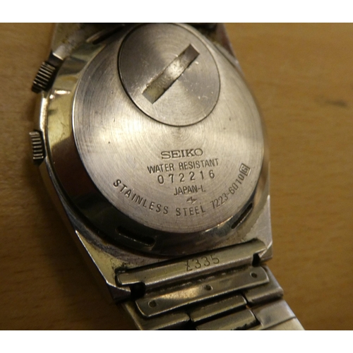 176 - A Seiko Alarm Quartz stainless steel bracelet watch, faced by a baton dial 