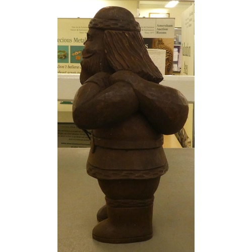 184 - A carved wooden figure, Father Christmas carrying a sack  13