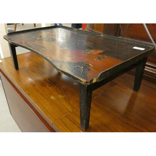 191 - A late 19thC Japanese lacquered and painted tray table  24