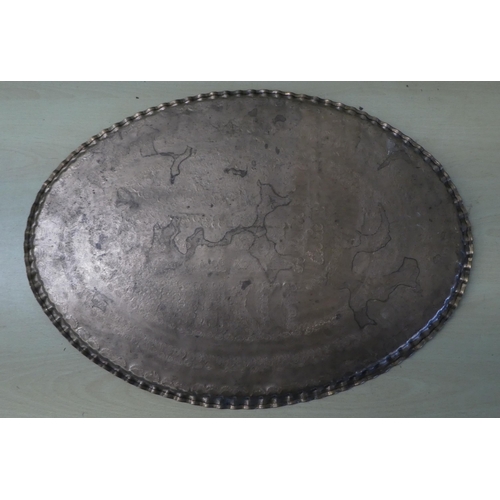 200 - An oval copper tray, impressed with repeating designs  stamped CPC  1970  22