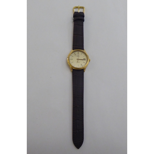 208 - An Omega DeVille gold plated and stainless steel cased wristwatch, the quartz movement faced by a ba... 