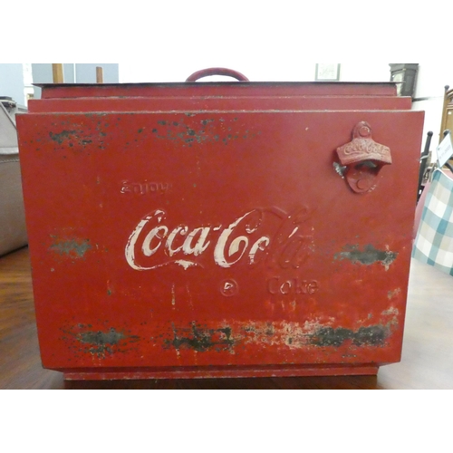 226 - A modern cast and red painted metal bound cool box, branded for 'Coca-Cola'  15