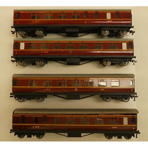 229 - Four Hornby 00 gauge tinplate passenger coaches  boxed; another unboxed example; and four goods... 