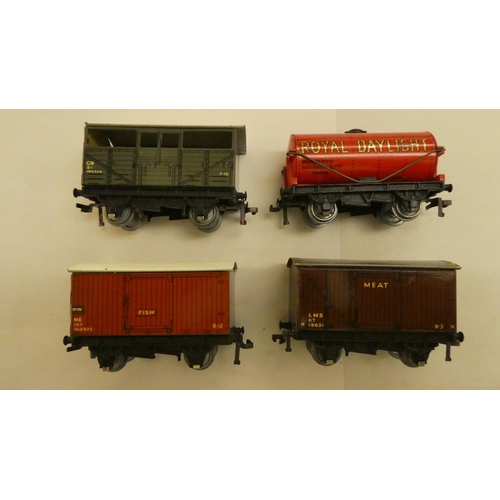 229 - Four Hornby 00 gauge tinplate passenger coaches  boxed; another unboxed example; and four goods... 