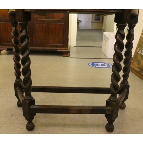 245 - A 1930s oak demi-lune single drawer side table, raised on barleytwist legs  34