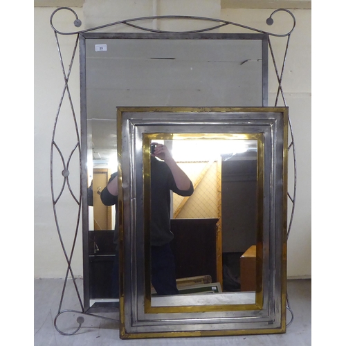 25 - Two modern mirrors, set in metal frames  33