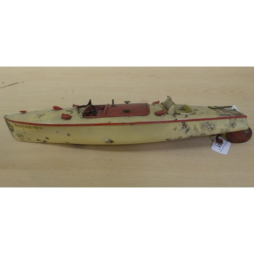 251 - A Hornby tinplate clockwork model, a Racer III speed boat  17