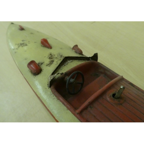 251 - A Hornby tinplate clockwork model, a Racer III speed boat  17