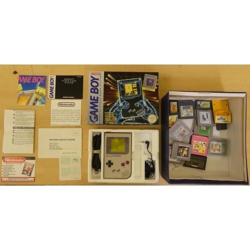 257 - A Game Boy with various games