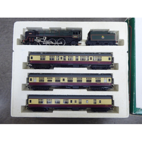 283 - Hornby railways, viz. The Flying Scotsman Limited Edition presentation set  boxed; and another ... 