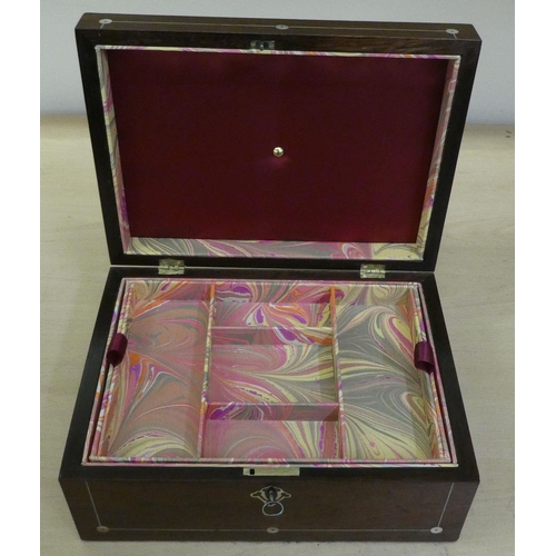 299 - A late Victorian mother-of-pearl inlaid rosewood workbox, the hinged lid enclosing a removable tray&... 