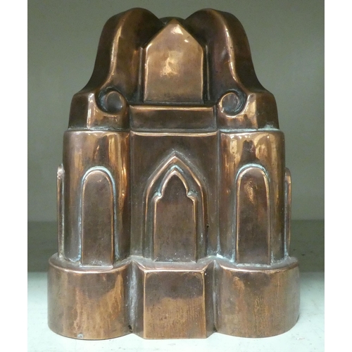 300 - A late Victorian copper jelly mould, fashioned as a church  6.25