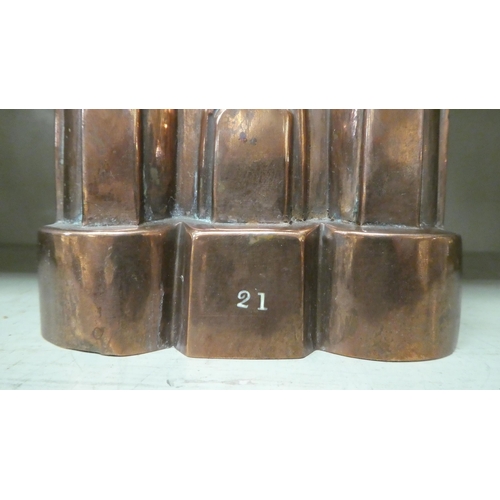 300 - A late Victorian copper jelly mould, fashioned as a church  6.25