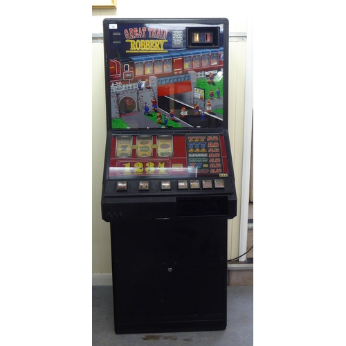 307 - A circa 1980s electrically powered 'Great Train Robbery' themed fruit machine  66