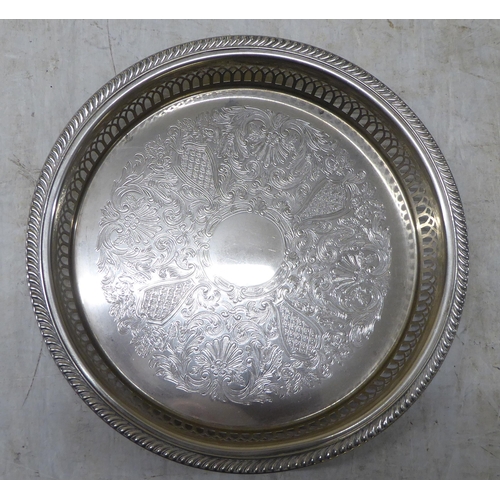 31 - Silver and silver plate: to include decanter labels; photograph frames; and a Christening tankard