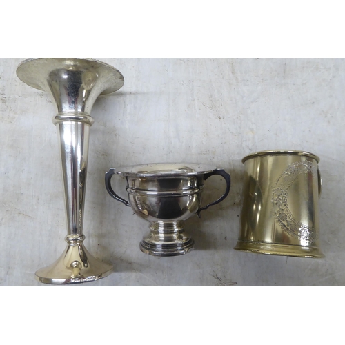 31 - Silver and silver plate: to include decanter labels; photograph frames; and a Christening tankard