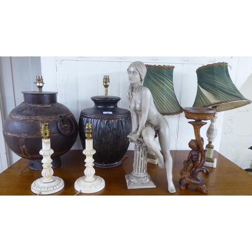 34 - A mixed lot: to include interior lighting; and various table lamps  largest 14