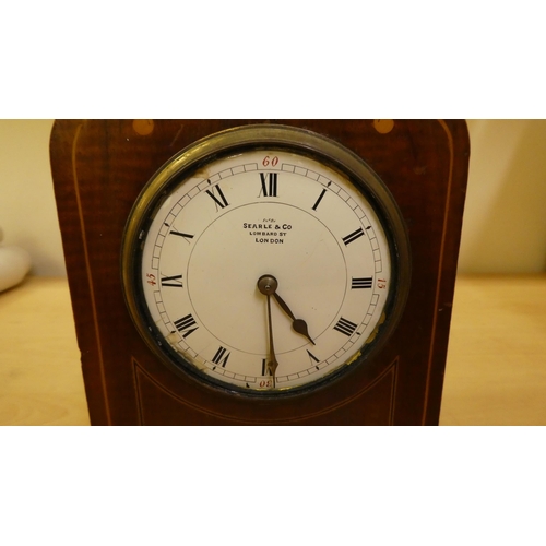 36 - Two dissimilar Edwardian mahogany cased mantle clocks, one faced by an Arabic dial  11.75