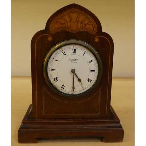 36 - Two dissimilar Edwardian mahogany cased mantle clocks, one faced by an Arabic dial  11.75