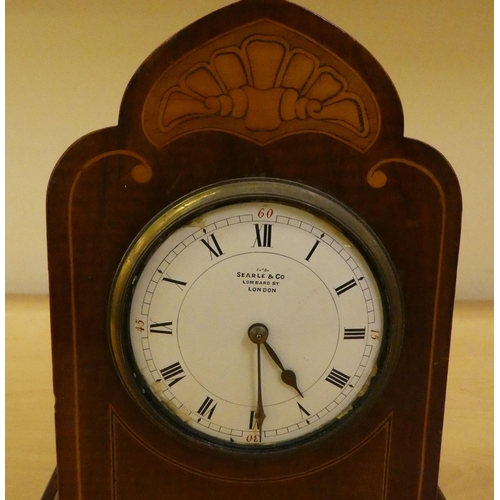 36 - Two dissimilar Edwardian mahogany cased mantle clocks, one faced by an Arabic dial  11.75