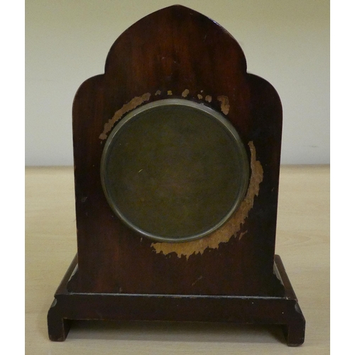 36 - Two dissimilar Edwardian mahogany cased mantle clocks, one faced by an Arabic dial  11.75