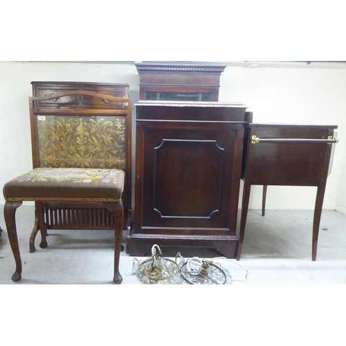 49 - Small 20thC furniture: to include an oak framed 1920s embroidered panel firescreen  34