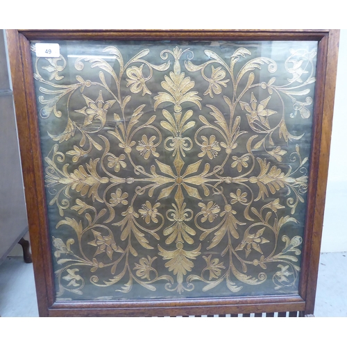 49 - Small 20thC furniture: to include an oak framed 1920s embroidered panel firescreen  34