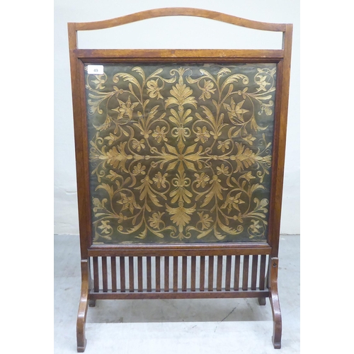 49 - Small 20thC furniture: to include an oak framed 1920s embroidered panel firescreen  34