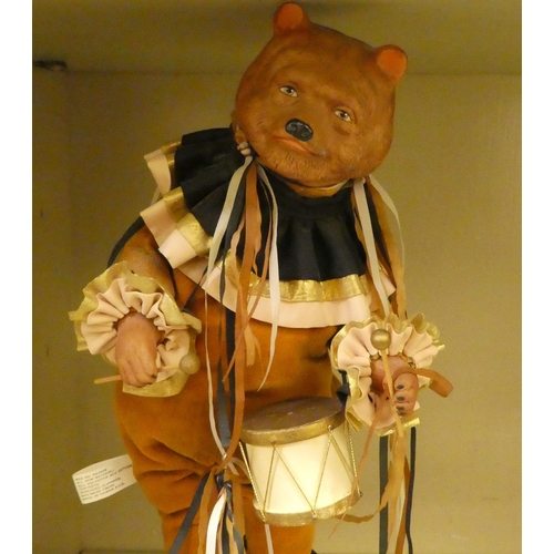 5 - An Enesco Drummer bear, designed by Faith Wick, on a music box plinth  no.358  16