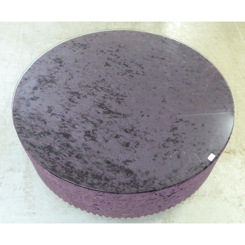 53 - A modern stud upholstered crushed purple velvet coffee table, on a plinth  17