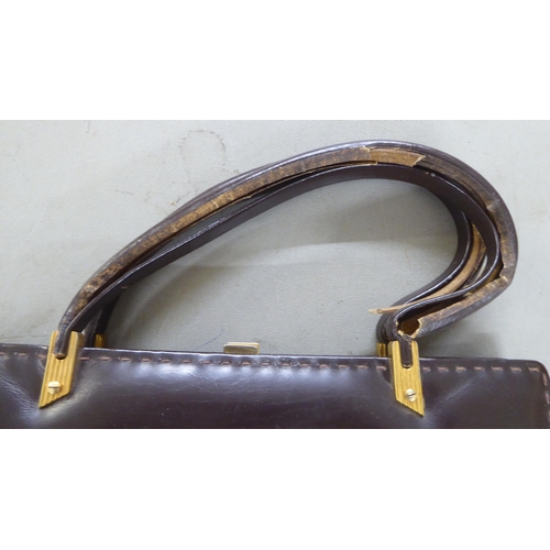 54 - Six dissimilar ladies handbags: to include a simulated snakeskin hide example 