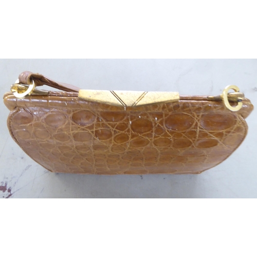 54 - Six dissimilar ladies handbags: to include a simulated snakeskin hide example 