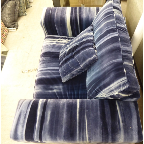 57 - A modern box design settee with a low back, upholstered in striped blue/grey fabric with a cushioned... 