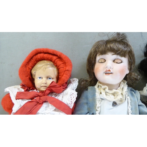 7 - Dolls: to include an early 20thC Armand Marseille bisque head example with painted features, on a jo... 