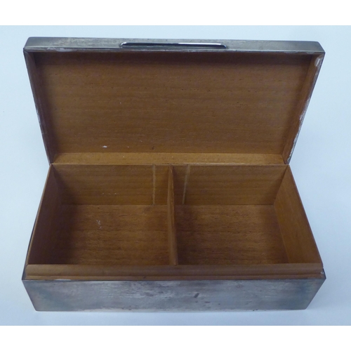 83 - A silver cigarette box with a cedar lined interior  Birmingham 1937  2