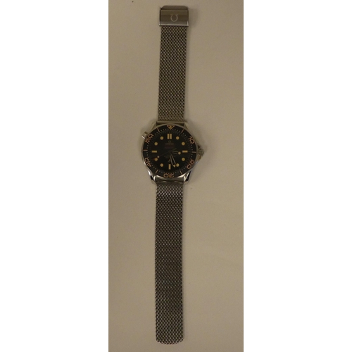 84 - A stainless steel cased and strapped automatic wristwatch 