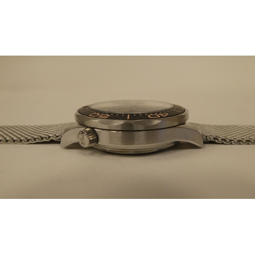 84 - A stainless steel cased and strapped automatic wristwatch 