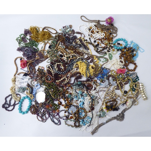 87 - Costume jewellery and items of personal ornament: to include coloured bead necklaces; and filigree b... 