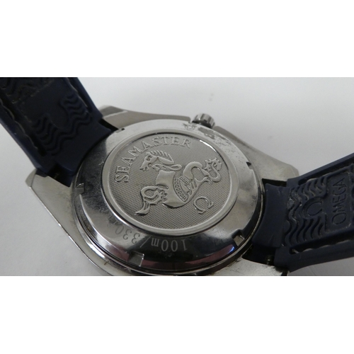 88 - A stainless steel and enamel cased automatic wristwatch, on a rubber strap 