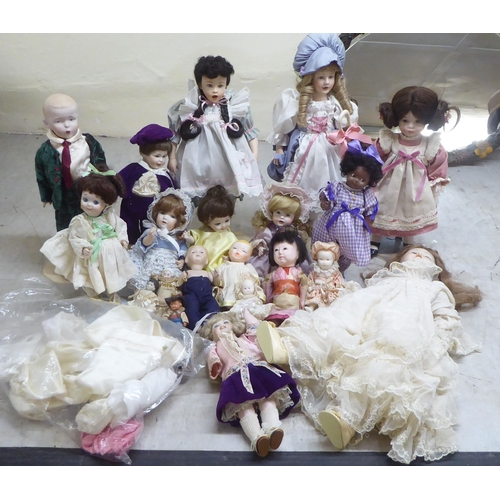 9 - Modern porcelain collectable dolls: to include an example by DNK with painted features  15